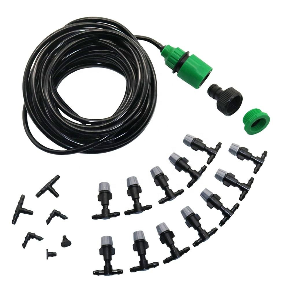 Garden drip irrigation kit with tubing, connectors, emitters and spray nozzles on a white background.