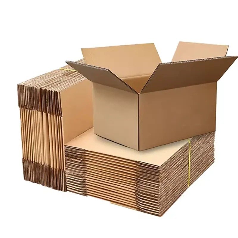 Corrugated shipping boxes and mailers on a white background.